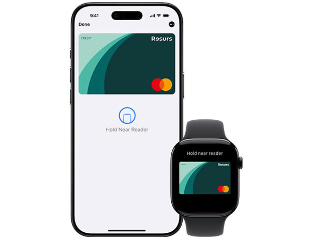 Mobil och klocka som visar Resurs kreditkort.